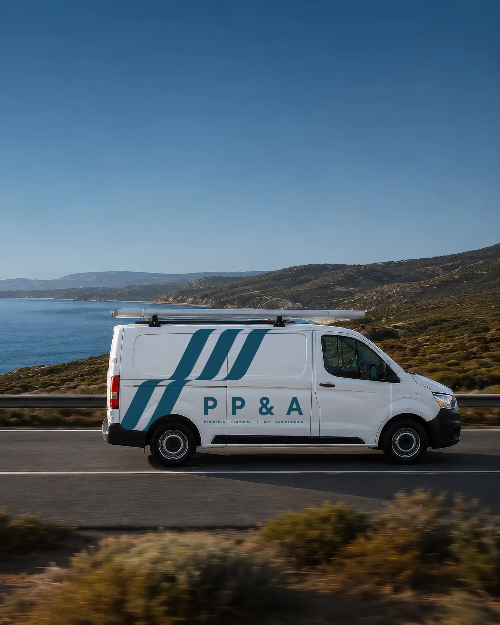 Peninsula Plumbing & Air Con van on the coast